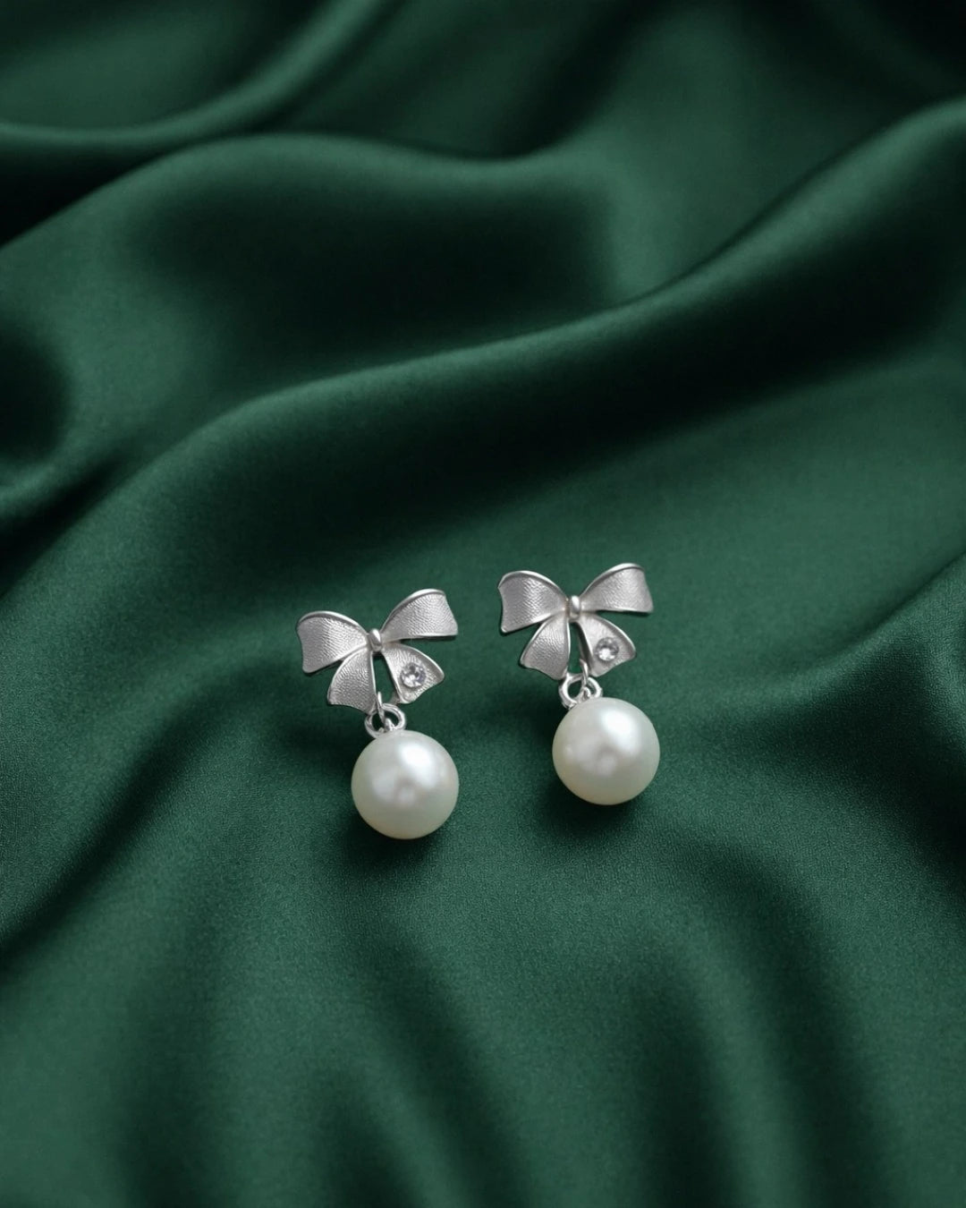 Silver Bow Pearl Drop Earrings