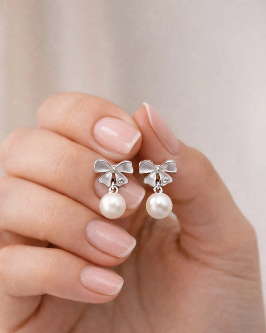 Silver Bow Pearl Drop Earrings